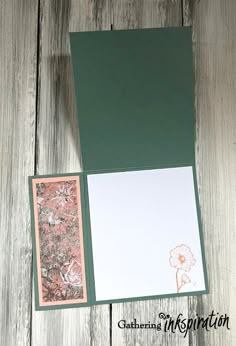 the inside of a card with an envelope and two cards on it, sitting next to each other