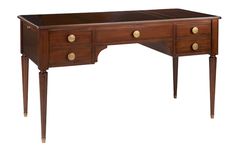 a wooden desk with two drawers on one side and gold knobs on the other