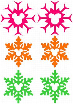 four different colored snowflakes on a white background