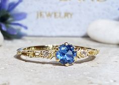 Don't miss this opportunity to own this beautiful gemstone ring crafted in 14k gold filled You can wear the rings as a set together or each ring by it self. => Gemstone Type - Blue Topaz, Clear Quartz => Gemstone Cut - Faceted => Gemstone Size - 4.5mm, 1.5mm => Total Number of Gemstones - 3 => Metal Type - 14k Gold Filled (Tarnish Resistant And Nickel Free) - also available in 925 sterling silver * Please contact me for pricing on a sizes larger than 11 * ~ Feel free to ask me abo Handmade Topaz Rings As A Gift, Topaz Birthstone Ring For Gift With Round Stone, Topaz Crystal Ring With Round Cut For Gift, Gift Round Cut Topaz Crystal Ring, Gift Crystal Topaz Ring With Round Cut, Heirloom Topaz Rings For Gift, Heirloom Topaz Ring Gift, Heirloom Style Topaz Ring As Gift, Heirloom Style Topaz Ring Gift