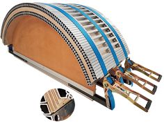 a close up of a musical instrument on a white background with blue ribbon around it