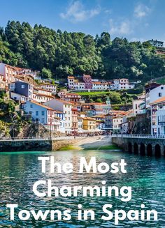 the water and buildings in town with text overlay that reads 10 most charming towns in spain