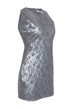 Get ready for a hot night out in Miami with this frock from Elizabeth & James! A hot cocktail dress in a grey hue and funky metallic abstract print in a sultry silhouette, this dress is sure to make you sizzle. Go for a stylish South Beach look with silver-toned heels and a sparkly clutch. Size 8 Shell: 48% Polyester, 47% Viscose, 5% Spandex Lining: 48% Polyester, 47% Viscose, 5% Spandex Sliver-toned back zipper Lined Bodycon silhouette Scoop neckline Sleeveless Bust 32” Waist 28" Shoulder to he Chic Silver Stretch Dress, Fitted Metallic Mini Dress For Holiday, Metallic Fitted Mini Dress For Holiday, Fitted Metallic Mini Dress For Cocktail, Metallic Fitted Mini Dress For Cocktail, Gray Bodycon Dress For Night Out, Gray Fitted Mini Dress For Night Out, Metallic Fitted Bodycon Dress For Cocktail, Metallic Stretch Mini Dress For Evening