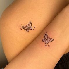 two small tattoos on the arms of women, one with butterfly and star tattoo designs