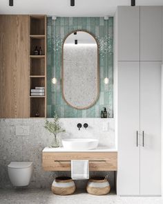 a bathroom with green tile and wooden cabinets