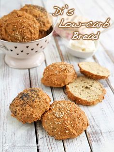 some bread in a white bowl on a wooden table with the words diy's low - carb bread