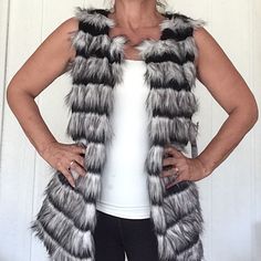 Signature Studios Faux Fur Sleeveless Vest. Nwt. Size Medium. Classy Chic Sleeveless Vest. Faux Fur Black And White Striped. Brand New No Flaws. Open Front, No Closures. All Measurements Are Taken Flat Across And Approximate. Bust 20.5” Length Center Back To Hem 26”. Cozy Soft Faux Fur. Fully Lined With Silky Polyester In Black. Chic Sleeveless Outerwear With Faux Fur Trim, Sleeveless Faux Fur Vest For Fall, Sleeveless Fur Coat With Faux Fur Trim, Fitted Sleeveless Vest With Faux Fur Lining, Sleeveless Faux Fur Outerwear, Luxury Sleeveless Faux Fur Outerwear, Winter Faux Fur Vest With Fur Trim, Fitted Sleeveless Faux Fur Vest, Classy Chic