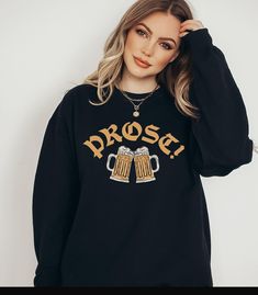 ❤ Get ready to be obsessed with your Oktoberfest sweatshirt! ❤ Buy today for yourself or for someone special! * Q U I C K * F A C T S * .: Comfy Gildan Crewneck Sweatshirt .: 50% cotton, 50% polyester .: Medium-heavy fabric (8.0 oz/yd² (271.25 g/m .: Loose fit .: Sewn-in label TSHIRT  LINK: https://owlpostapparel.etsy.com/listing/1796755665 SWEATSHIRT LINK: CROP TOP/BABY TEE: * S I Z E * G U I D E * .: Loose fit, see sizing guide in listing photos .: Sizes available: Adult S ~ 2XL * S H I P P I N G * T I M E S * *Our items are individually made with love for each of our buyers. Because of this, our processing times is 1~7 business days. We know our customers want their items as quickly as possible! * K E E P * S H O P P I N G * Shop our entire apparel collection here: https://www.etsy.com/ Oktoberfest Munich, Munich Oktoberfest, Oktoberfest Shirt, Baby Crop Top, Baby T Shirts, Shirt For Women, Baby Tee, Sew-in Labels, Munich