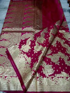 Heavy kataan Benarasi silk saree for wedding, woven with heavy gold zari thread. This rich saree is ideal for wedding wear, teams best with gold jewellery. Traditional wedding wear. Saree length is 5.5m with 0.8m blouse piece. Benarasi Saree Wedding, Silk Saree For Wedding, Saree Blue, Saree For Wedding, Wedding Wear Saree, Jewellery Traditional, Golden Saree, Katan Silk Saree, Wedding Pink