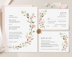 wedding stationery suite with pink flowers and greenery