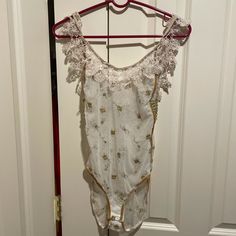 Nwt Free People Sheer White Bodysuit With Embroider Flower Detail And Lace. Size Xs. Never Worn. Tags And Panty Liner Still Intact Originally $98 Embroider Flower, Free People Bodysuit, Panty Liner, Floral Print Tunic, Embroidery Top, Cutout Bodysuit, Boho Tunics, White Bodysuit, Flower Detail