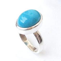 Natural Arizona Turquoise Ring, Natural Sleeping Beauty Turquoise Ring, 925 Sterling Silver Arizona Turquoise Ring, Natural Blue Turquoise Rings. Product:- Ring Modal no:- 340 Metal:- 925 Sterling Silver Gemstone :- Arizona Turquoise (Sleeping Beauty Turquoise) Gemstone size:- 10x14 mm Approx Finishing:- Shiny Silver We are using Pure 925 (Stamped) Sterling Silver with Natural Gemstone Jewelry, all of our jewelry designs are Handmade. We are adding new creative designs in our store regularly, fo Turquoise Larimar Ring As Gift, Turquoise Larimar Ring For Gift, Polished Turquoise Ring As Gift, Polished Turquoise Ring For Gift, Turquoise Larimar Round Ring, Turquoise Larimar Ring, Tourmalated Quartz Ring, Tourmalated Quartz, Arizona Turquoise