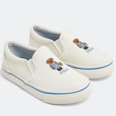 New Without Tags Or Box. Ralph Lauren's Canvas Slip-On Sneakers Are Embroidered With A Polo Strawberry Bear. Easy To Slip On And Off, These Keaton Bear Sneakers By Polo Ralph Lauren Are Sure To Be Your Little Ones' Favourite Go-To Sneakers. They're Designed With A Canvas Upper, Durable Rubber Sole And Embroidered Bear Logo On The Top. Canvas Upper Round Toe Slip-On Style Rubber Sole Color: Cream/Blue Tagged A Us Children's Size 6, Uk Size 5.5, Eu Size 39. This Could Also Fit A Women's Size 7.5-8 Casual Cream Sneakers With Soft Sole, Cream Slip-on Canvas Shoes With Rubber Sole, Casual Canvas Shoes With Embroidered Logo, Polo Ralph Lauren Shoes, Embroidered Bear, Polo Shoes, Child Fashion, Halloween Wallpaper Cute, Strawberry Bear