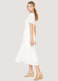 Our Middle of Nowhere Midi Dress is perfect for any adventure you plan this spring! With it's clean white floral pattern, this style features a smocked back bodice for stretch and comfort, with flirty, puffed sleeves and a delicate lace trim throughout the hemline. Invisible back zipper with clasp closure. Fully Lined Imported 100% Cotton Model is 5 ft 9 inches; Bust: 32", Waist: 23.5", Hips: 35" and wearing a size Small Runs true to size Hand wash or wash with gentle cycle with cold water with Middle Of Nowhere, Puffed Sleeves, Xl Dress, Dresses Xs, Air Dry, The Middle, Lace Trim, Puff Sleeve, Cold Water