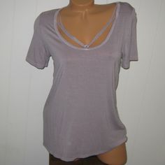 Aeo Taupey Lavender Cut Out Sexy Tee~ Soft And Sexy Line And Size M. Nwot..Never Worn Lavender Stretch Tops For Summer, Purple V-neck Top With Built-in Bra, Summer Lavender Stretch Tops, Purple Tops With Built-in Bra For Night Out, Purple Stretch Tops For Loungewear, Lavender Top For Night Out In Spring, Purple Gray, Purple Grey, American Eagle Outfitters