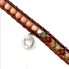 Nwt! Handmade, Leather Wrap Bracelet Made With 4mm Unakite And Rosewood Beads. Features A Small, Silver-Tone Butterfly Charm To Remind Us Of Our Own Ripple Effect On The World. Festival Brown Wrap Bracelet With Natural Stones, Brown Natural Stone Wrap Bracelet For Festivals, Festival Natural Stones Brown Wrap Bracelet, Brown Hand Wrapped Wrap Bracelet As Gift, Brown Hand Wrapped Wrap Bracelet Gift, Brown Natural Stone Wrap Bracelet Gift, Healing Brown Wrap Bracelet With Natural Stones, Spiritual Brown Wrap Bracelet For Healing, Brown Leather Bracelet With Natural Stones For Gift