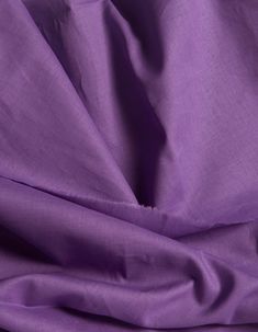 the fabric is very soft and has a slight stain on it's edges, which makes it appear to be purple