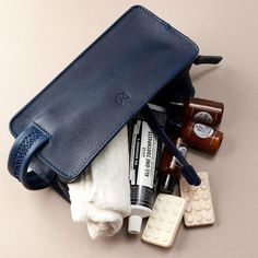 The Barber Leather Toiletry Bag; functional minimalist design, perfect for travel with all your shaving toiletries. Features a water resistant easy to clean liner interior, an inner pocket with a hand stitched zipper pull tab and a cross pattern handle with 86 hand stitches. Our designer wash dopp kit is the perfect gift for men that love clean designs: simple and functional Hand Stitches, Leather Dopp Kit, Clary Sage Essential Oil, Mens Toiletry Bag, Leather Toiletry Bag, Ipad Bag, Travel Storage Bag, Dopp Kit, Cross Patterns