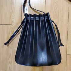 Banana Republic Factory, Black Faux Leather Accordion Bucket Bag, Nwt This Faux Leather Cutie Is An Expandable Accordion Style To Hold All Your Treasures! Strap Is Long Enough To Be Worn Crossbody Or Shoulder Only, 48"-52" (Adjustable). Total Bag Dimensions 11"H X 9"W X 5"D. Elegant Black Bag With Long Strap, Black Faux Leather Bucket Bag With Adjustable Strap, Black Leather Bag With Long Strap, Black Faux Leather Crossbody Bucket Bag, Black Faux Leather Bucket Bag With Removable Pouch, Black Faux Leather Bucket Bag With Detachable Strap, Evening Faux Leather Hobo Bag With Adjustable Strap, Black Faux Leather Bucket Satchel, Accordion Bag