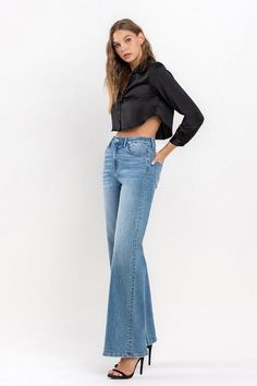 VERVET High Rise Wide Leg Jeans Comfort stretch denim designed with a medium wash, high rise, wide leg cut, and finished with a clean sewn hemline. The wide leg silhouette adds a touch of vintage-inspired charm, giving them a chic and timeless look. Designed to be full-length, these jeans offer versatile styling options for any occasion. Comfort stretch denim Medium wash High rise Wide leg cut Clean sewn hem Rise: 10.5" Inseam: 33.5" Fabric Content: 93% Cotton / 6% Polyester / 1% Spandex Model i High Rise Wide Leg Jeans, Flying Monkey Jeans, Lined Jeans, Denim Design, China Fashion, Sheer Fabrics, Wide Leg Jeans, High Waist Jeans, Jeans Fit