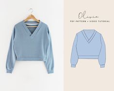 a blue sweater hanging on a hanger next to an image of the front and back of