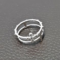 This ring was designed for Wedding Couple Ring of US customer. Stone color can be changed by customer's request. This can be made in 14k, 18k. Custom-made only no inventory item. Return is not acceptable. Offsite ad order cannot be accepted. *Metal : 14K Gold (hall-marked,gold color can be selected) *Stone: Natural white diamond(1.8mm/pc) *Metal weight: about 4.5gran - 4.8Grams (it has a different weight up to ring size) *band width : about 7mm *Authorized Gem Certification will be provided(this Anniversary White Gold Cross Rings, Diamond Accented Cross Promise Ring, Wedding Rings With Diamond Cross Design, Cross Shaped Promise Ring With Diamond Accents, Cross Ring With Diamond Accents For Promise, Promise Ring With Cross Shaped Diamond Accents, Diamond Cross Ring With Diamond Accents For Promise, White Gold Cross-shaped Promise Ring, Cross-shaped Promise Ring With Diamond Accents