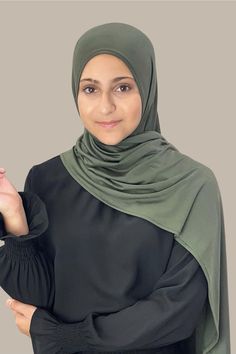 Our Modish Girl-Instant Hijabs are a must have! They are custom made for petite young girls. They are pre-sewn to easily slip on & wrap effortlessly. The Modish Girl Instant Premium Jersey hijab-Army Green was designed to be a head wrap that is ready in seconds. Simply pull over your head and adjust your hijab into place. It’s that simple!!! No pins required. Made from a high quality jersey fabric that feels cooling and breathable for ultimate comfort all day long. Our goal was to create the mos Jersey Hijab, Hijab Pins, Head Wrap, Print Chiffon, Active Women, Gym Wear, Mommy And Me, Head Wraps, Your Head