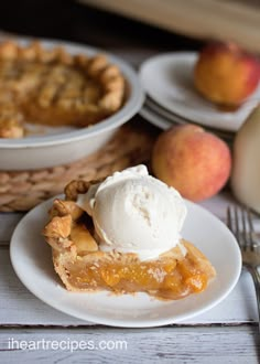 a slice of pie on a plate with ice cream and peaches in the background