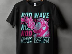 Embrace your love for hip hop with this vibrant Rod Wave inspired T-shirt! Perfect for fans of the genre, this graphic tee features a bold illustration capturing the essence of the music and the artist's influence. Made with high-quality materials for comfort and durability, it's an ideal addition to your streetwear collection. Whether you're out with friends or attending a concert, this unisex top is sure to make a statement. Get yours today and wear your music passion proudly! Product Features Rod Wave Shirt, Bold Illustration, Music Passion, Rod Wave, Streetwear Collection, Music Culture, Hip Hop Artists, Fashion Top, Good Brands