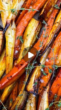 roasted carrots with herbs and seasoning on top