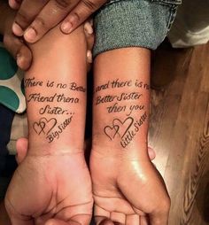 two people holding hands with tattoos on their arms and the words, there is no place to