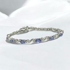 R.H. Macy & Co. Fine Jewelry Tanzanite And Diamond Sterling Silver Dainty Tennis Bracelet Condition: Excellent. Like New. Only Worn It Maybe Twice. Silver Tennis Bracelet, Macys Jewelry, Tanzanite Diamond, Tennis Bracelet, Womens Jewelry Bracelets, Color Purple, Tennis, Fine Jewelry, Like New