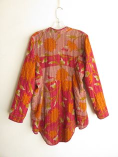 "Gorgeous kantha coat, with a long tail in the back, fastens with wooden toggle buttons. All hand-stitched. Sleeves are extra long and can be cuffed. Measurements laying flat: 15.75\" across shoulders 21\" underarm to underarm 18.5\" across middle 24\" front length, 34\" back length -- from back of neck to hem 24\" sleeve length" Orange Long Sleeve Kurta For Spring, Bohemian Orange Long Sleeve Kurta, Traditional Long Sleeve Tunic For Fall, Fitted Bohemian Kurta For Fall, Toggle Button, Clothing And Textile, Vintage Floral Print, Wool Blazer, Vintage Floral