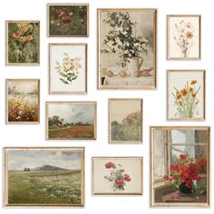 a bunch of paintings that are hanging on the wall in front of a window with flowers