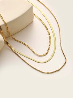 Layered Chain Necklace - Women's Necklaces - Someone & HerOwn Trendy Multi-strand Layered Chain Necklace, Multi-strand Figaro Chain Necklace, Elegant Multi-strand Figaro Chain Jewelry, Elegant Multi-strand Gold Plated Necklace, Elegant Double Chain Herringbone Necklace As Gift, Elegant Gold Layered Necklace With Adjustable Chain, Elegant Herringbone Necklace With Double Chain Gift, Elegant Double Strand Layered Necklace For Everyday, Elegant Everyday Layered Necklace With Delicate Chain