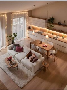 a living room filled with furniture and lights