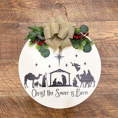 a christmas ornament with the nativity scene on it