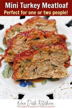 two meatloaf slices on a white plate with text overlay that reads mini turkey meatloaf perfect for one or two people