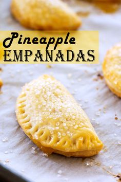 pineapple empanadas on a baking sheet with the words pineapple empanadas above them