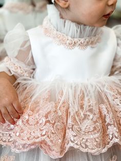 Petite Maison Kids. Gorgeous occasion dress in white color with peachy pink lace embroidery. Feathers on waistline. Faux Mother of Pearl beading. Multiple layers of tulle. Cotton lining on bodice. Back zipper closure. Tulle Embroidery, Pearl Beading, Dreamy Aesthetic, Feather Dress, Pink Tulle, Lace Embroidery, Peachy Pink, Petite Dresses, Pink Lace