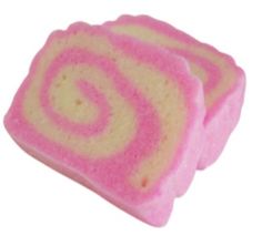 two slices of pink and white cake with swirls on it's sides, one slice cut in half