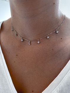 "❤ Welcome to My Store!❤ Our elegant and dainty star necklace combines moon and star charms together in one necklace for a magical celestial look on the neck. She can also be great as a holiday necklace this winter season! The necklace is made of rhodium over 𝟭𝟬𝟬% 𝟵𝟮𝟱 𝗦𝘁𝗲𝗿𝗹𝗶𝗻𝗴 𝗦𝗶𝗹𝘃𝗲𝗿 and adorned by a fine quality zircon in each of the star charms. ♦ Measurements ♦ Necklace length- 2 options: 14.17\" (36 cm) + 2\" (5 cm) like a choker 15.75\" (40 cm) + 2\" (5 cm) necklace ♦ Fo Silver Star Choker, Silver Charm Necklace With Star Charm, Silver Celestial Charm Necklace With Star Charm, Silver Star Charm Choker, Silver Star Charm Choker Jewelry, Silver Choker With Moon Charm As A Gift, Silver Choker With Moon Charm For Gift, Celestial Silver Choker Jewelry, Celestial Silver Choker Necklace