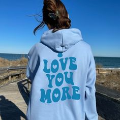 Daily Positivity: I LOVE YOU MORE ★ HOW TO ORDER ★ 1. Select the type: Hoodie or Sweatshirt 2. Select the size 3. Select the quantity 4. Add to cart ★ T-SHIRT DETAILS ★ Soft fabric that is lightweight and flexible. Bella Canvas 3001 tees are slightly longer than your normal tee * Solid colors: 100% cotton, Heather Colors: 52% Cotton, 48% Polyester * Unisex fit - runs true to size * Made to order * Digitally printed design (DTG) ★ HOODIE & SWEATSHIRT DETAILS ★ * 50% Cotton 50% Polyester * Classic Cheap Relaxed Fit Text Print Hoodie, Trendy Hooded Tops With Text Print, Love You More Hoodie, Gifts For Her Aesthetic, You Are Enough Hoodie, Positive Message Hoodie, Daily Positivity, Her Aesthetic, Beach Hoodie