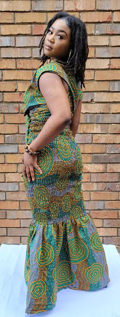 Ileke African Print Ankara Kitenge Smocked Dress-DP4081 Stretches Model is 5'6 Can be tied in different ways Fan not included, sold separately Fitted Green Midi Dress With Smocked Bodice, Green Fitted Midi Dress With Smocked Bodice, Fitted Multicolor Dress With Smocked Cuffs, Fitted Green Dress With Smocked Back, Fitted Short Sleeve Midi Dress With Smocked Cuffs, Fitted Sleeveless Dress With Smocked Cuffs, Fitted Midi Dress With Smocked Cuffs And Short Sleeves, Fitted Short Sleeve Smocked Maxi Dress, Fitted Smocked Maxi Dress With Short Sleeves