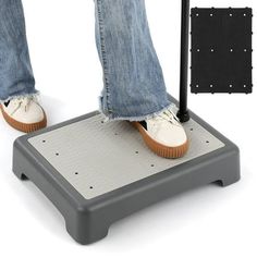 a person standing on top of a scale