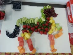 a horse made out of fruits and vegetables