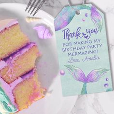 a piece of cake on a plate with a thank you tag