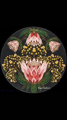 a black plate with pink flowers and green leaves on the side, in front of a black background