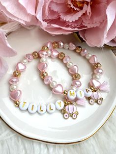 The sweetest princess bracelet and necklace gift set. Each item can be purchased individually or as a set. Necklace is 16 inch with a 1' extender (if you would like a different size just include the size in the personalised notes section). MATCHING EARRINGS AVAILABLE HERE! https://withlovejessieshop.etsy.com/listing/1787371534 ♥ MATERIALS ♥ NECKLACE - 18K Gold Plated Chain over brass - with carriage charm and initial letter BRACELET - Glass beads and imitation pearls, with carriage charm  ♥ HOW TO ORDER ♥ SIMPLY JUST CHOOSE YOUR ITEM AND SIZE THEN ADD THE NAME YOU WOULD LIKE IN THE PERSONALISED BOX ALONG WITH ANY OTHER PERSONALISATION REQUESTS (IF PURCHASING THE BRACELET) ♥ SHIPPING ♥ All items are sent via AUSTRALIA POST LETTER SERVICE - untracked Please allow 1-4 weeks for your item to b Princess Bracelet, Girls Bracelet, Princess Carriage, Letter Bracelet, Australia Post, Set Necklace, Childrens Gifts, Personalised Box, Gold Letters