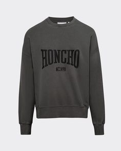 Our perennial sweatshirt in a washed ash-gray. Features a 'Honcho le PÈRE' boxing graphic on the front, black gradient stripes mimicking sweat on the sides, as well as a back yoke. Made in Portugal with premium Italian loopback cotton fleece, washed down to give a soft, worn-in look. Audi is 6'2 and wearing a size M. Boxing Graphic, Black Gradient, Ash Gray, Cotton Fleece, Ash Grey, Boxing, Audi, Ash, Portugal